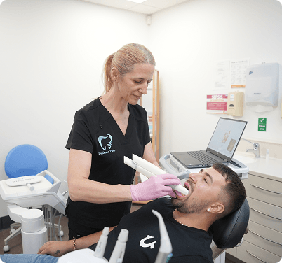 Dentist By The Green patient chair-side discussion