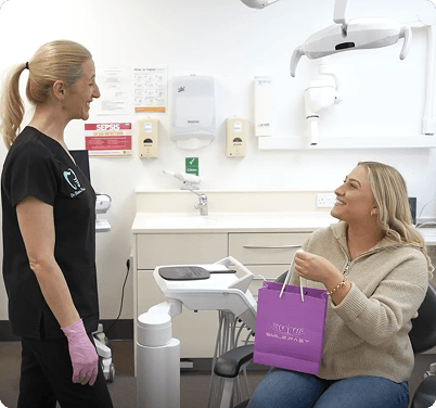 Dentist By The Green clinician working with patient