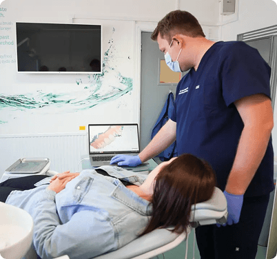 Dentist By The Green team and patient meeting