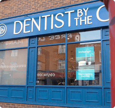 Dentist By The Green exterior with window signage
